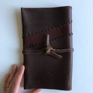 Hand stitched leather clutch